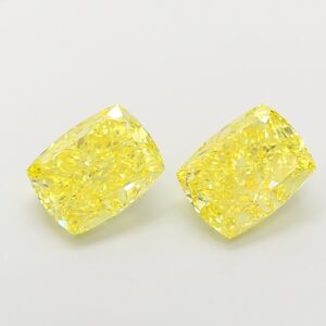 cushion 3.01ct pair fancy intense yellow vs2